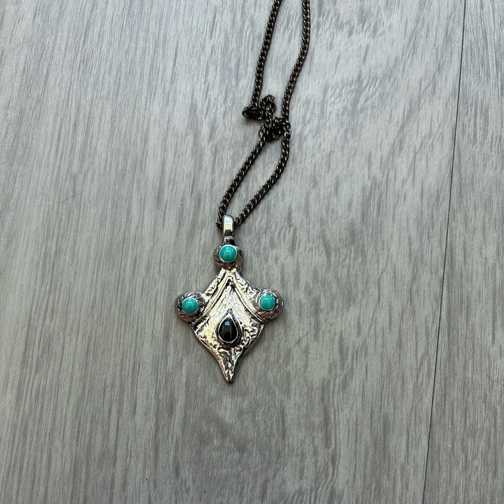 Silver necklace with turquoise accents